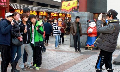الصين تدعو إلى تحسين خدمات تسجيل الإقامة والمعيشة للأجانب